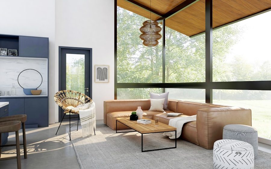 Bright family room with a tan L-shaped fabric sofa, coffee table and floor-to-ceiling windows