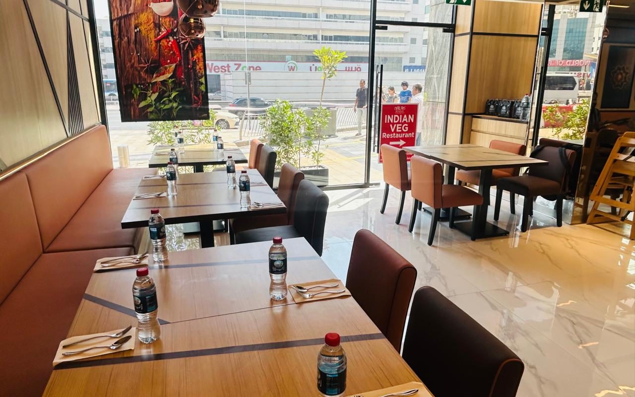Restaurant banquette seating along a window in Dubai