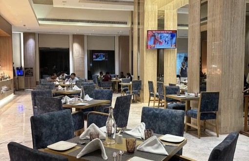 ELEV&Eacute; modern restaurant dining area with upholstered seating