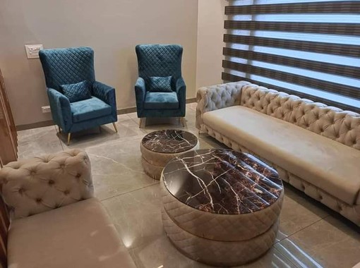 ELEV&Eacute; luxury white Chesterfield sofa with teal velvet accent chairs